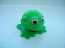 Photo of toy frog that somersaults