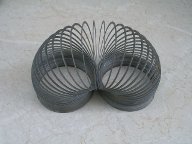 Photo of flat cut helical spring: Slinky